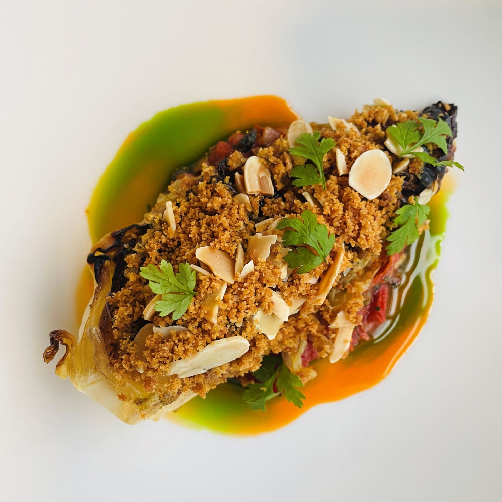 Roasted hispi cabbage, sun-dried tomato, smoked paprika, crispy caper, almond crumb website